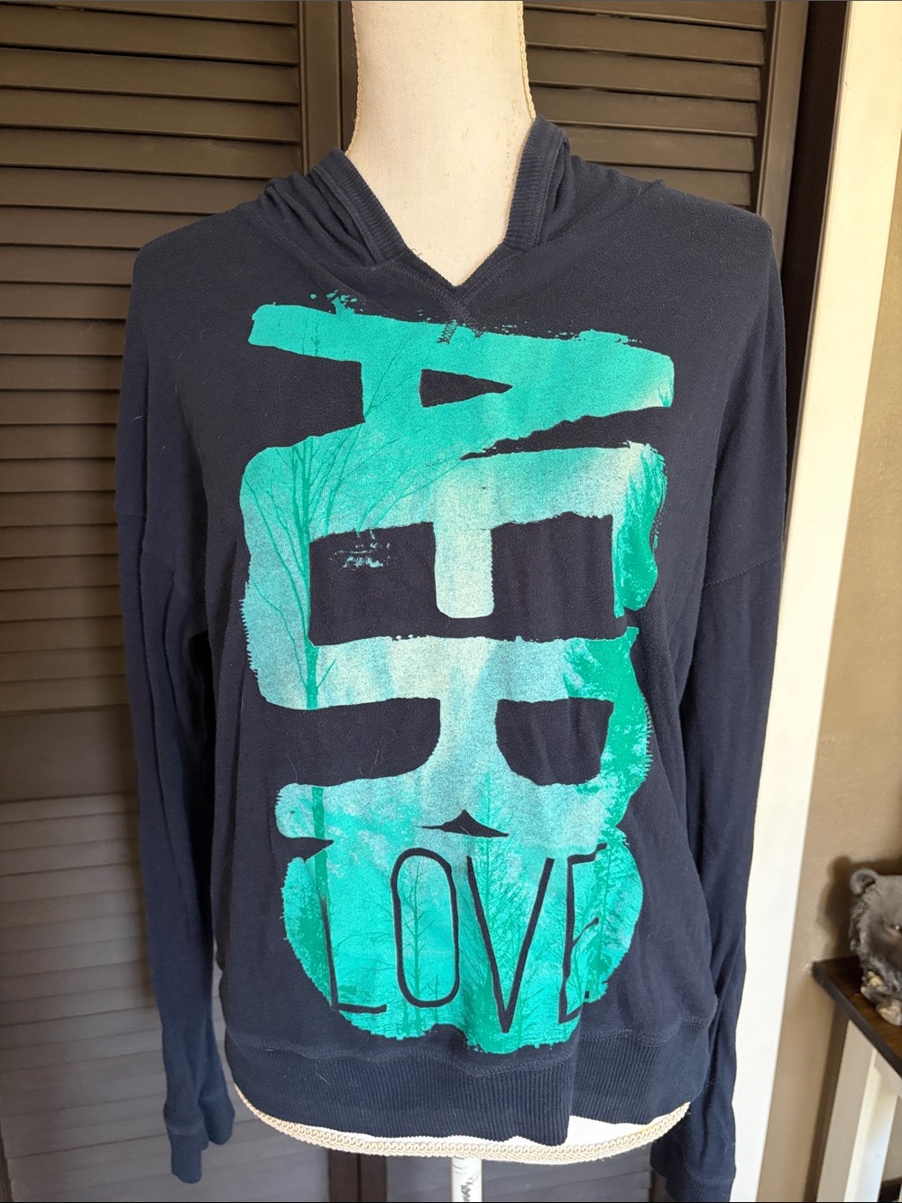 Love Aero women’s Navy V-Neck Sweater with Teal Graphic